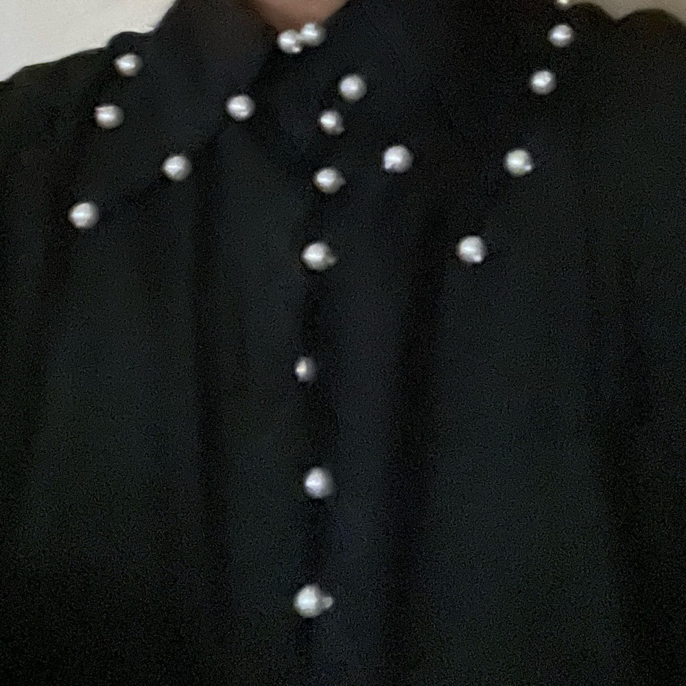 Black blouse with pearl trim